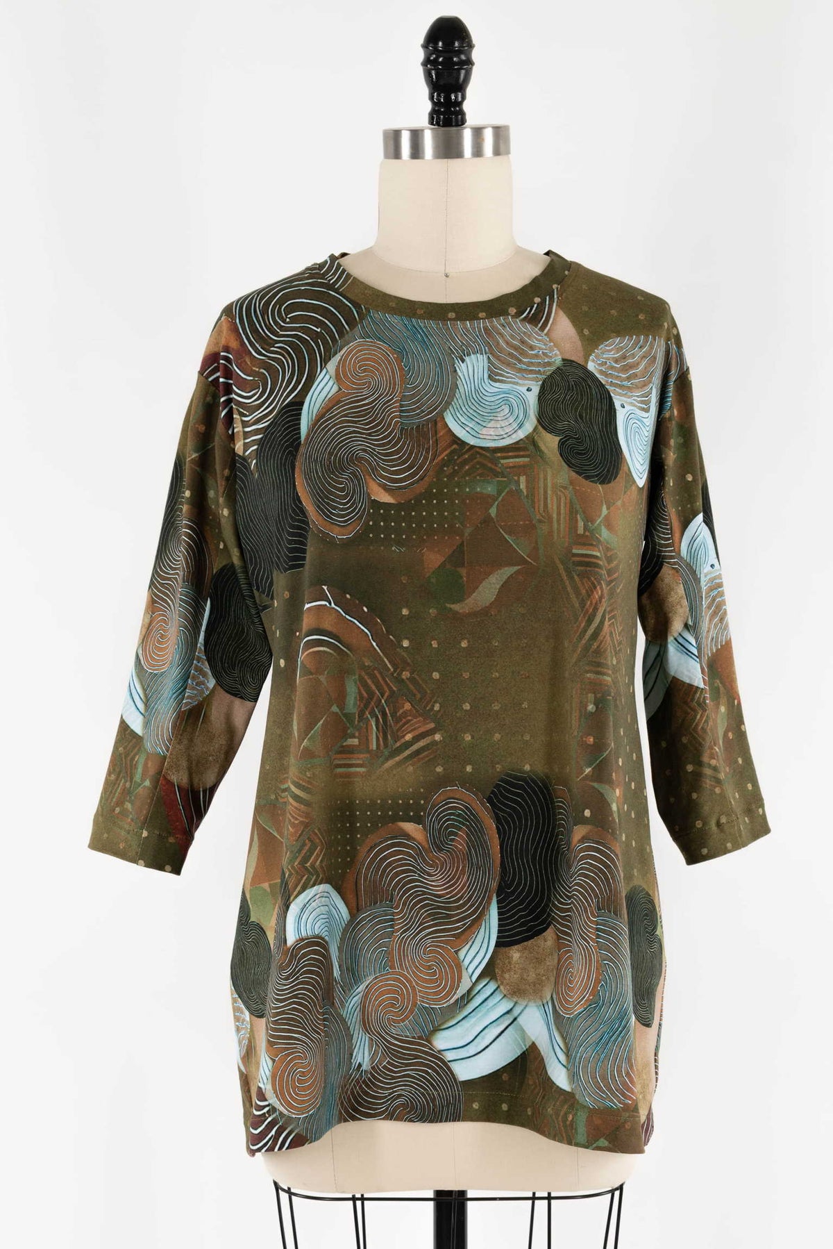 Abstract print tunic top with swirl patterns in earthy tones, ideal for creative sewing projects