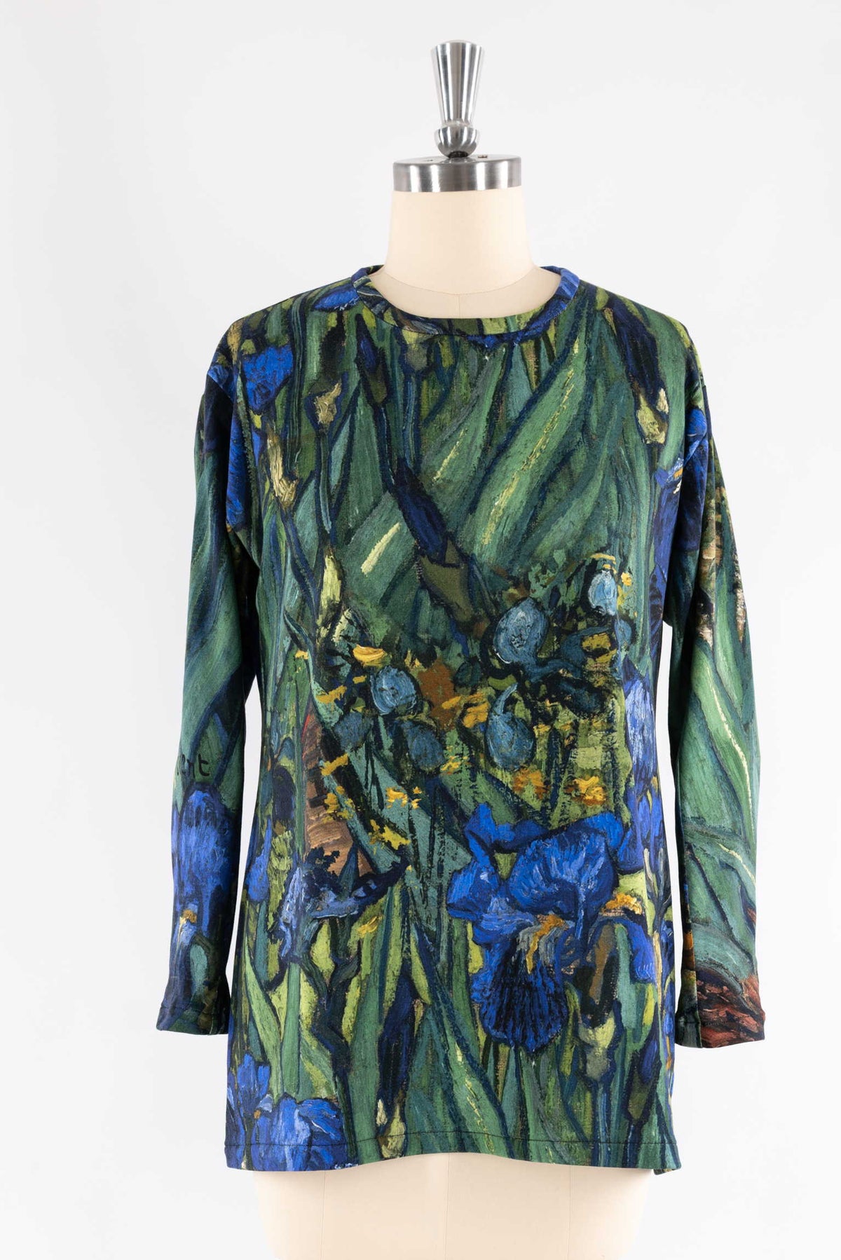 Long-sleeve floral print top with blue irises and green leaves, ideal for creative sewing projects