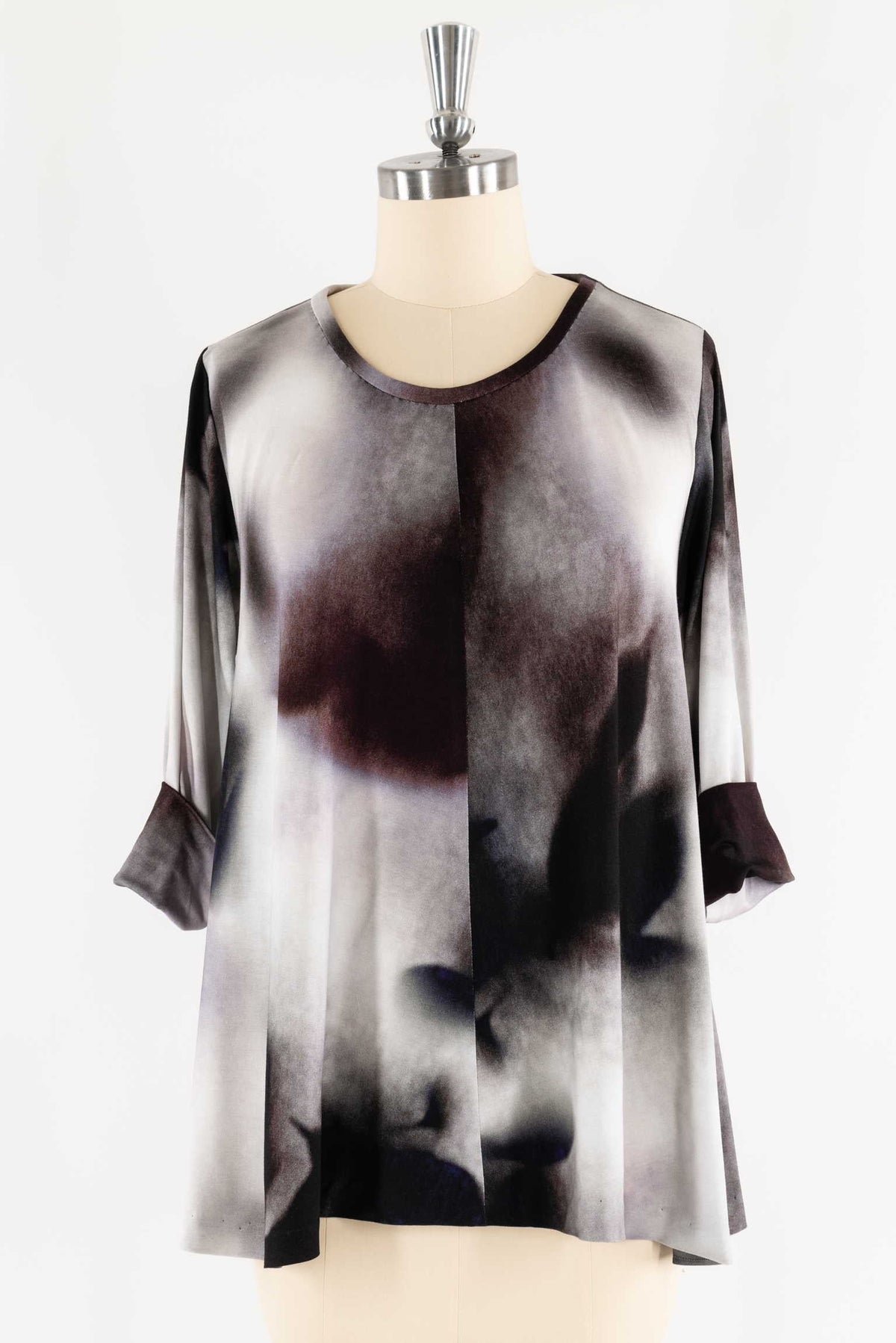 Abstract print blouse with 3/4 sleeves, ideal for fashion sewing projects