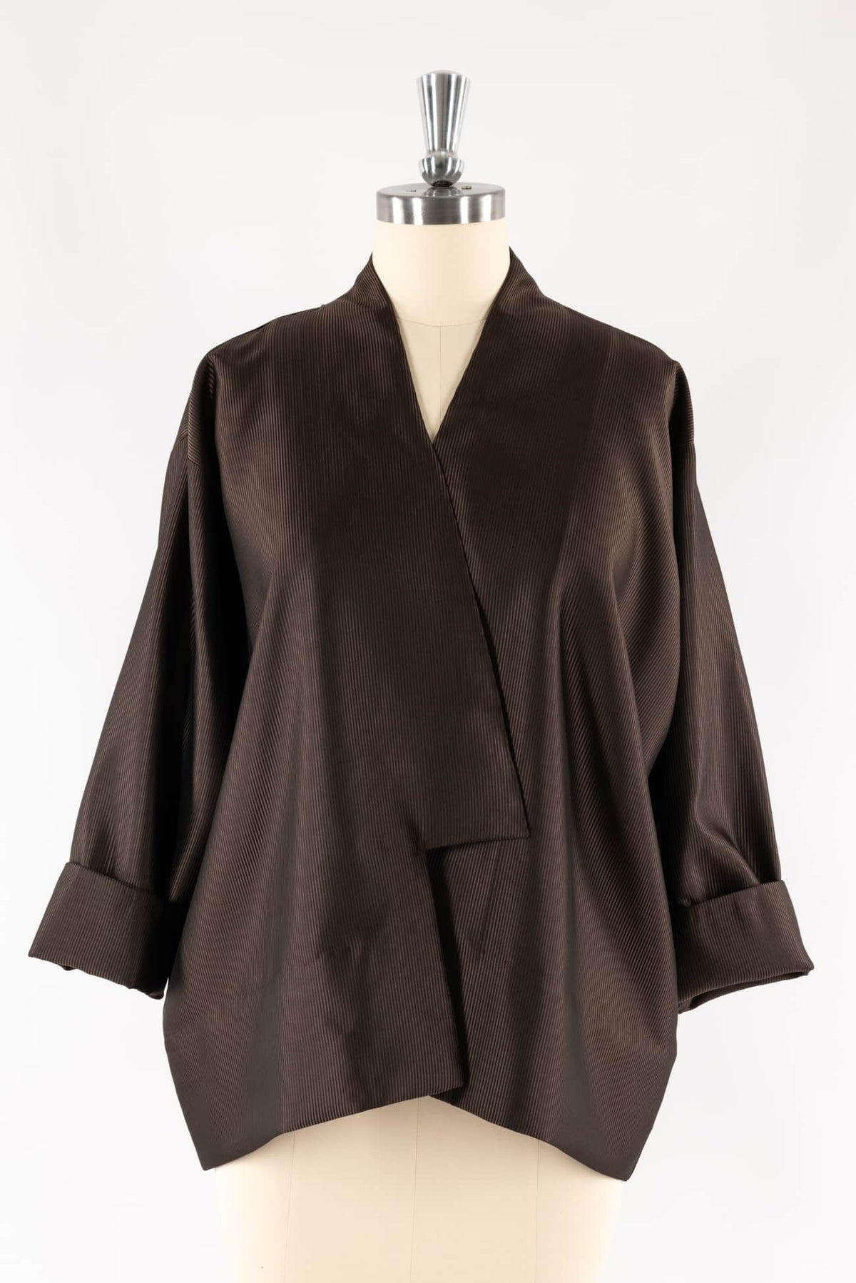 Brown ribbed fabric kimono-style top on mannequin, ideal for sewing apparel and creative projects