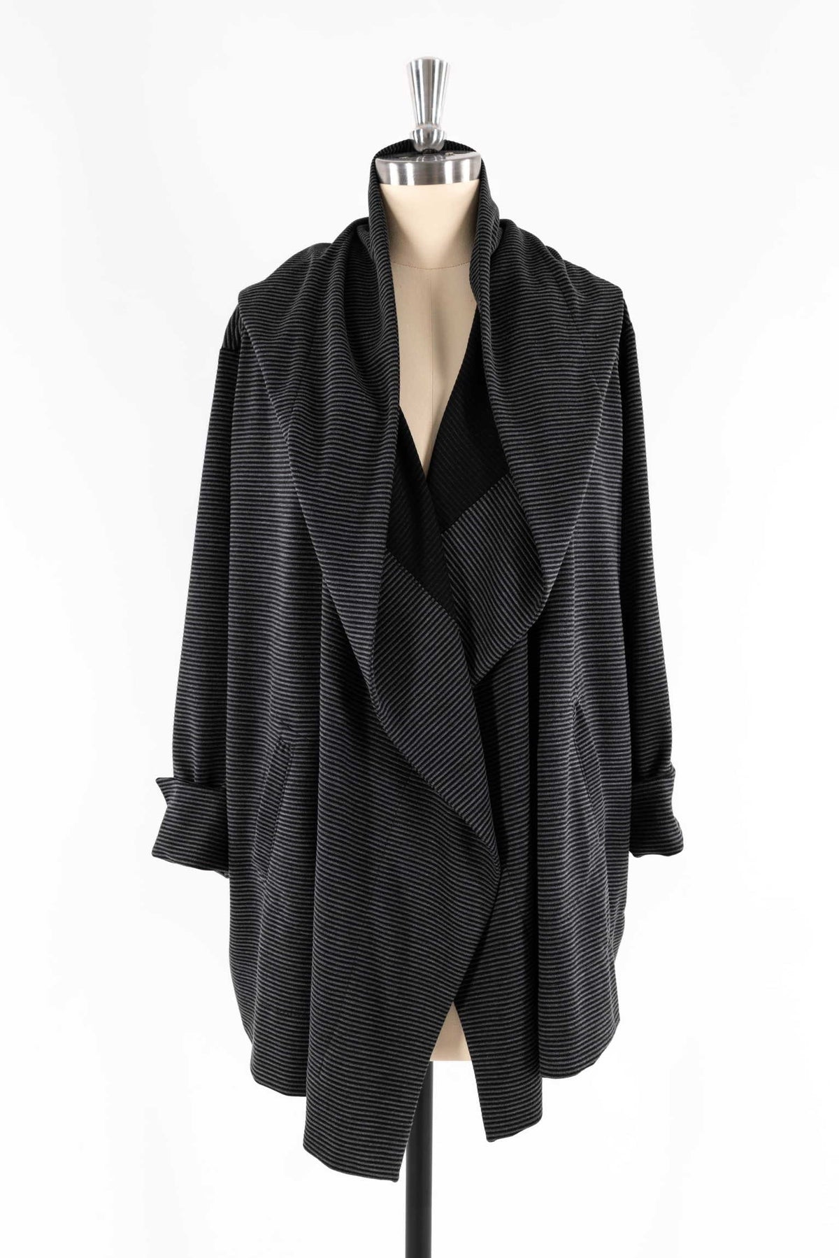 Black striped drape front cardigan on mannequin, ideal for sewing apparel with knit fabric