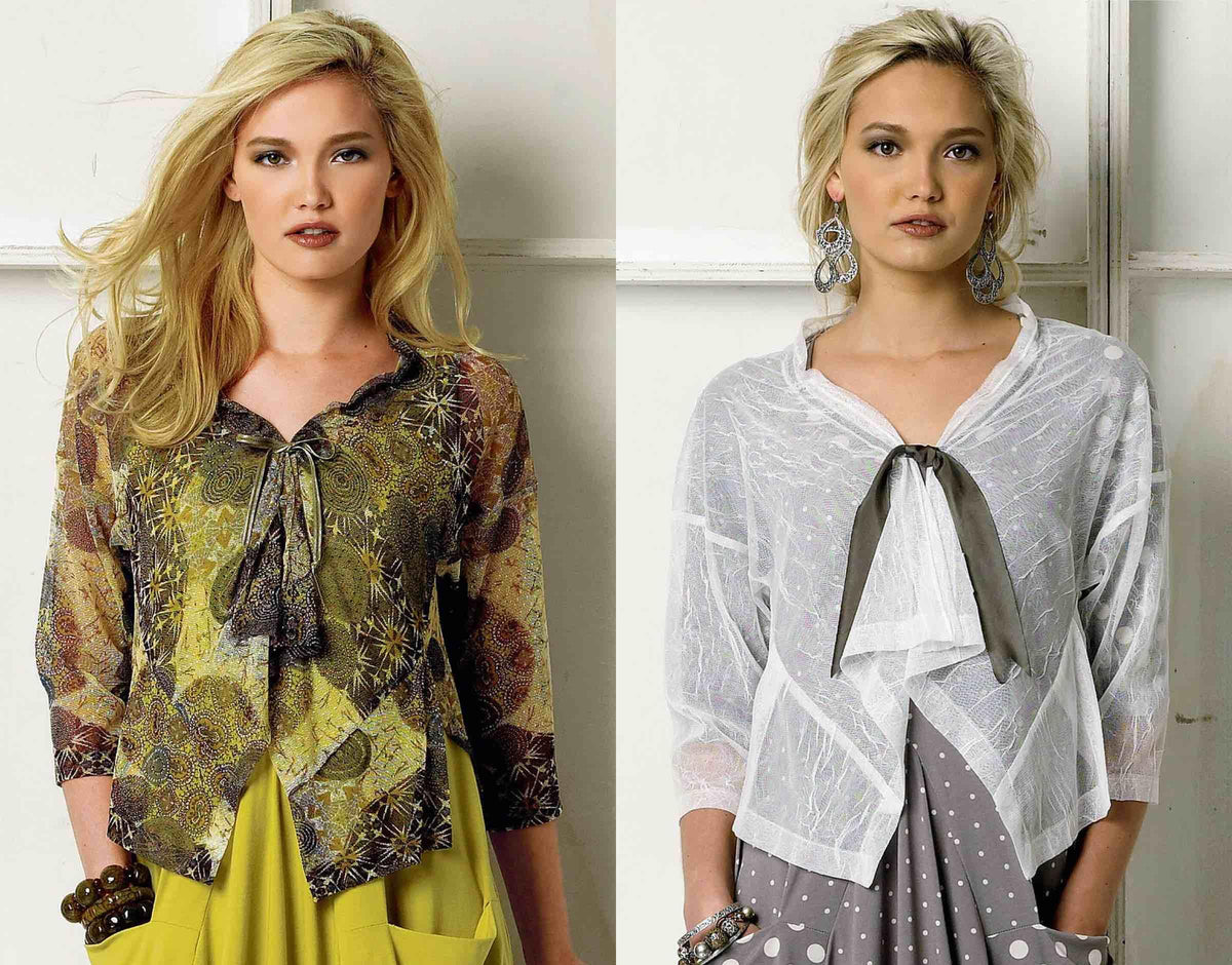 Two women modeling stylish tops made from patterned and sheer fabrics, ideal for sewing apparel projects.