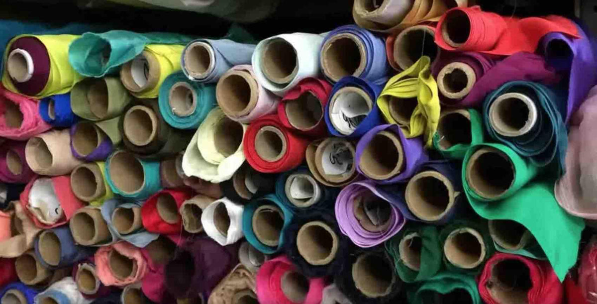 Colorful fabric rolls in cotton, linen, silk, rayon, wool, and blends for sewing, quilting, and apparel projects