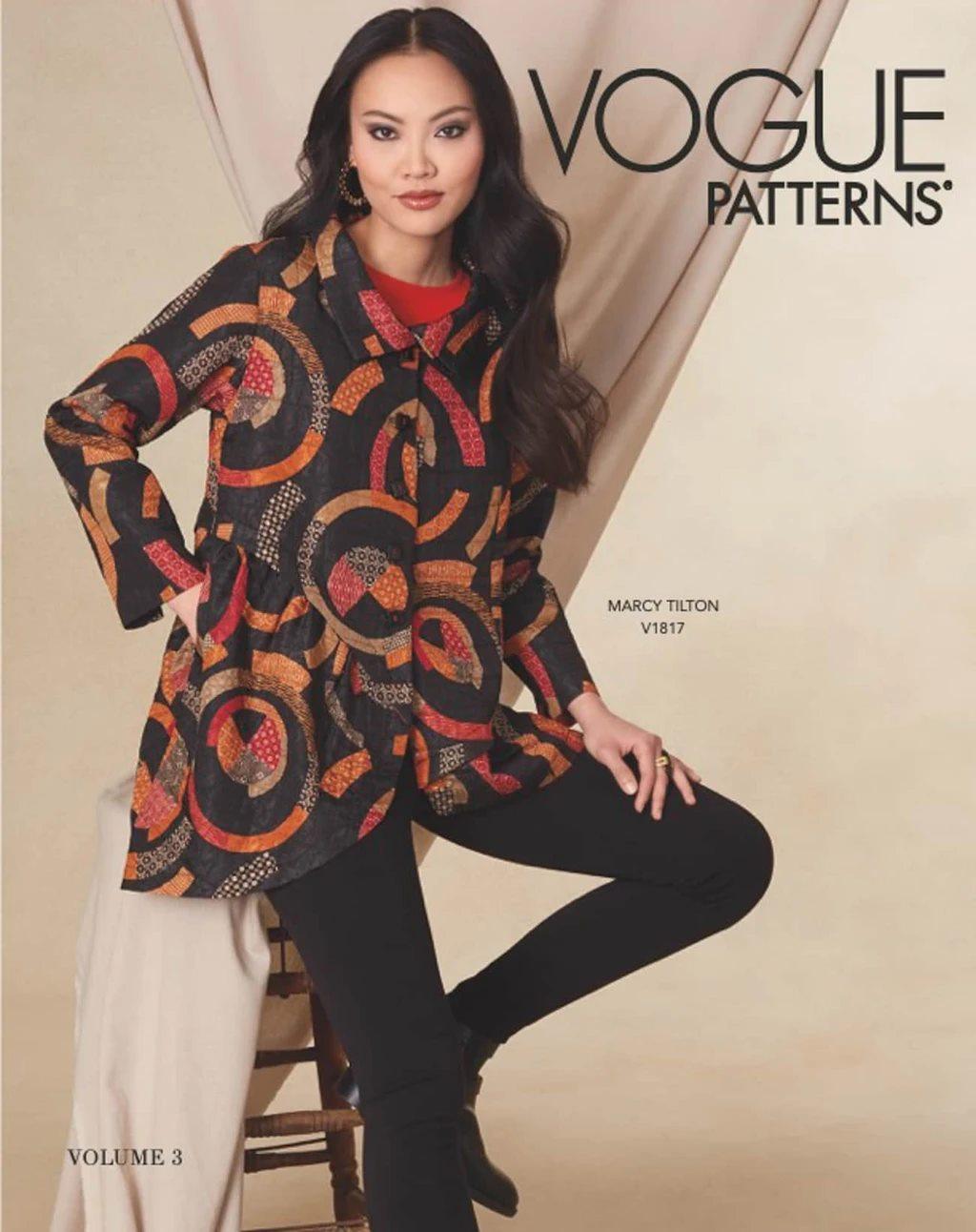 Woman modeling Marcy Tilton V1817 Vogue pattern jacket in bold geometric print, ideal for fashion sewing projects.