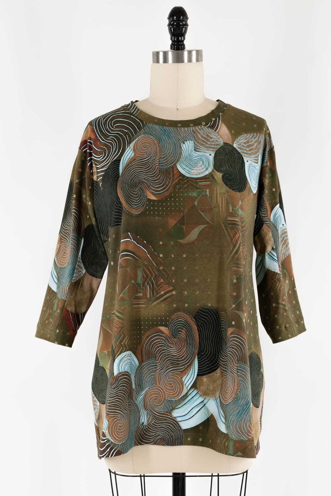 Abstract print tunic top with swirl patterns in earthy tones, ideal for creative sewing projects
