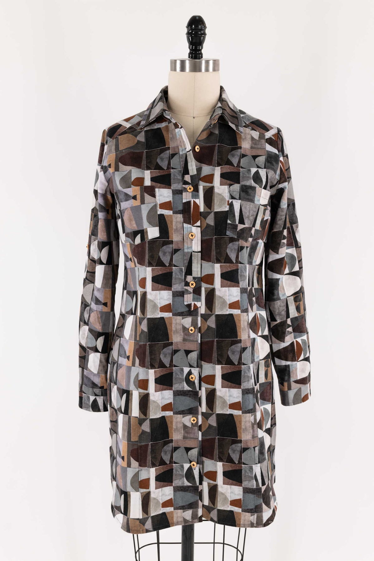 Abstract geometric print shirt dress in earth tones, ideal for fashion sewing projects