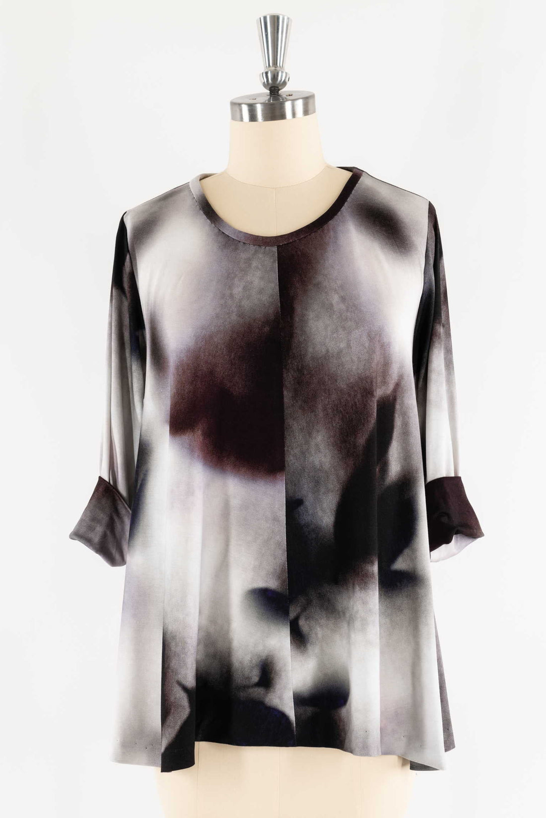 Abstract print blouse with 3/4 sleeves, ideal for fashion sewing projects
