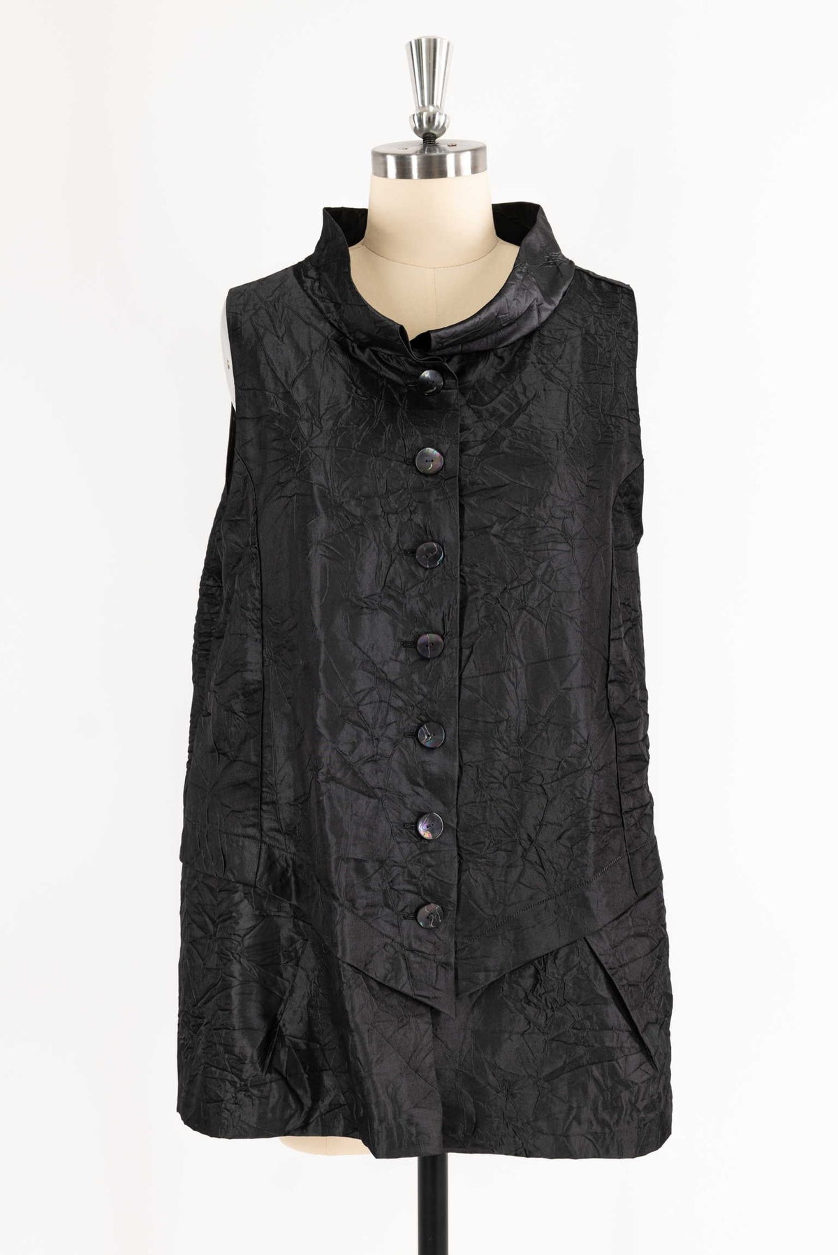 Black crinkled sleeveless top with button front and high collar