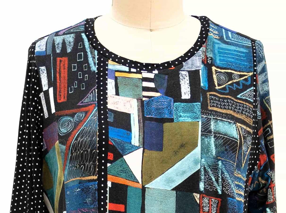 Abstract geometric print fabric top with polka dot trim, ideal for fashion sewing projects