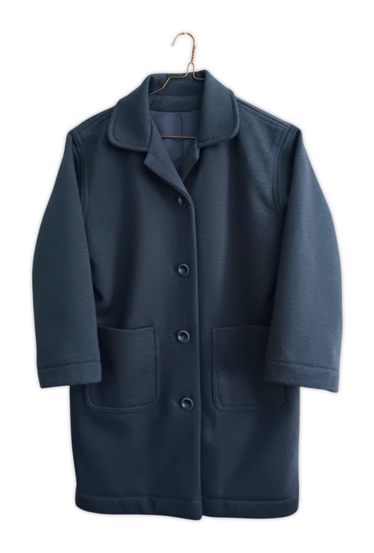 Navy wool coat with notched collar, front buttons, and patch pockets, ideal for sewing projects