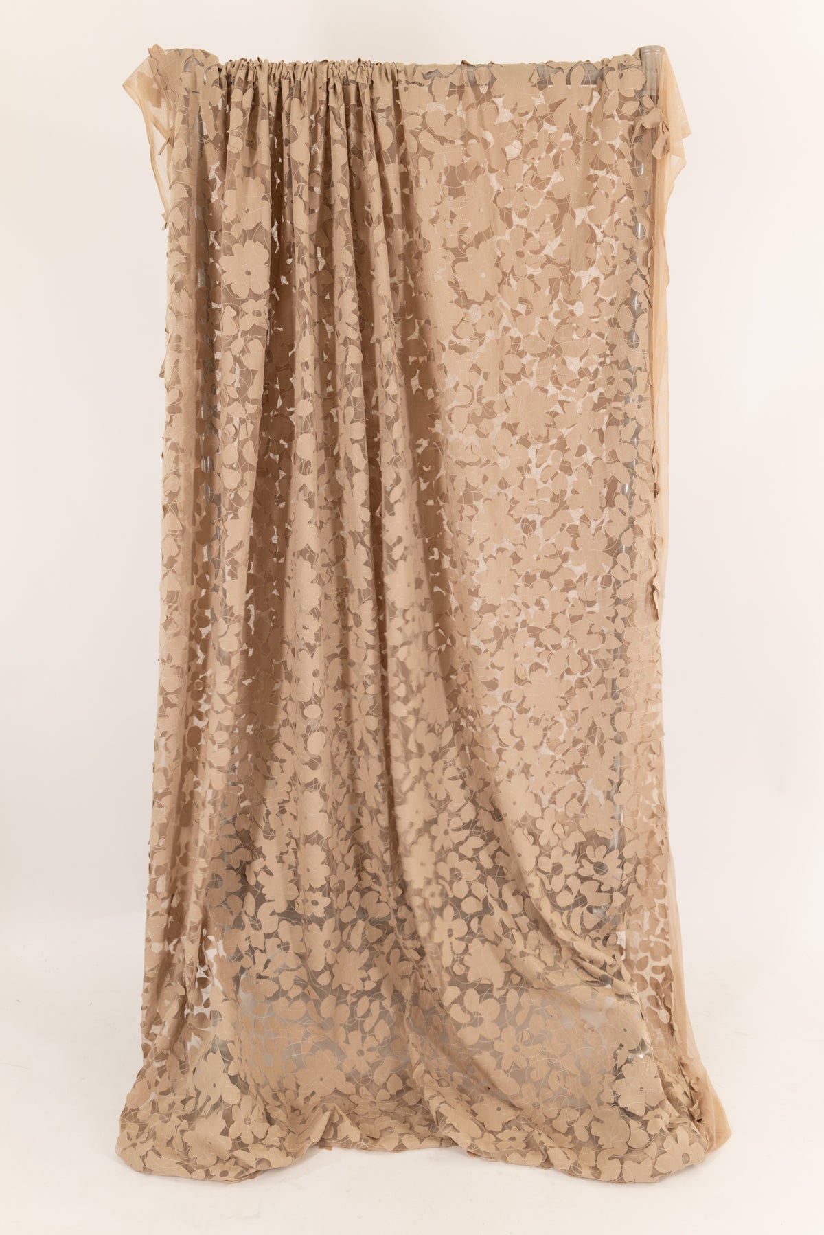 Tan floral print sheer fabric for apparel sewing, lightweight with delicate drape