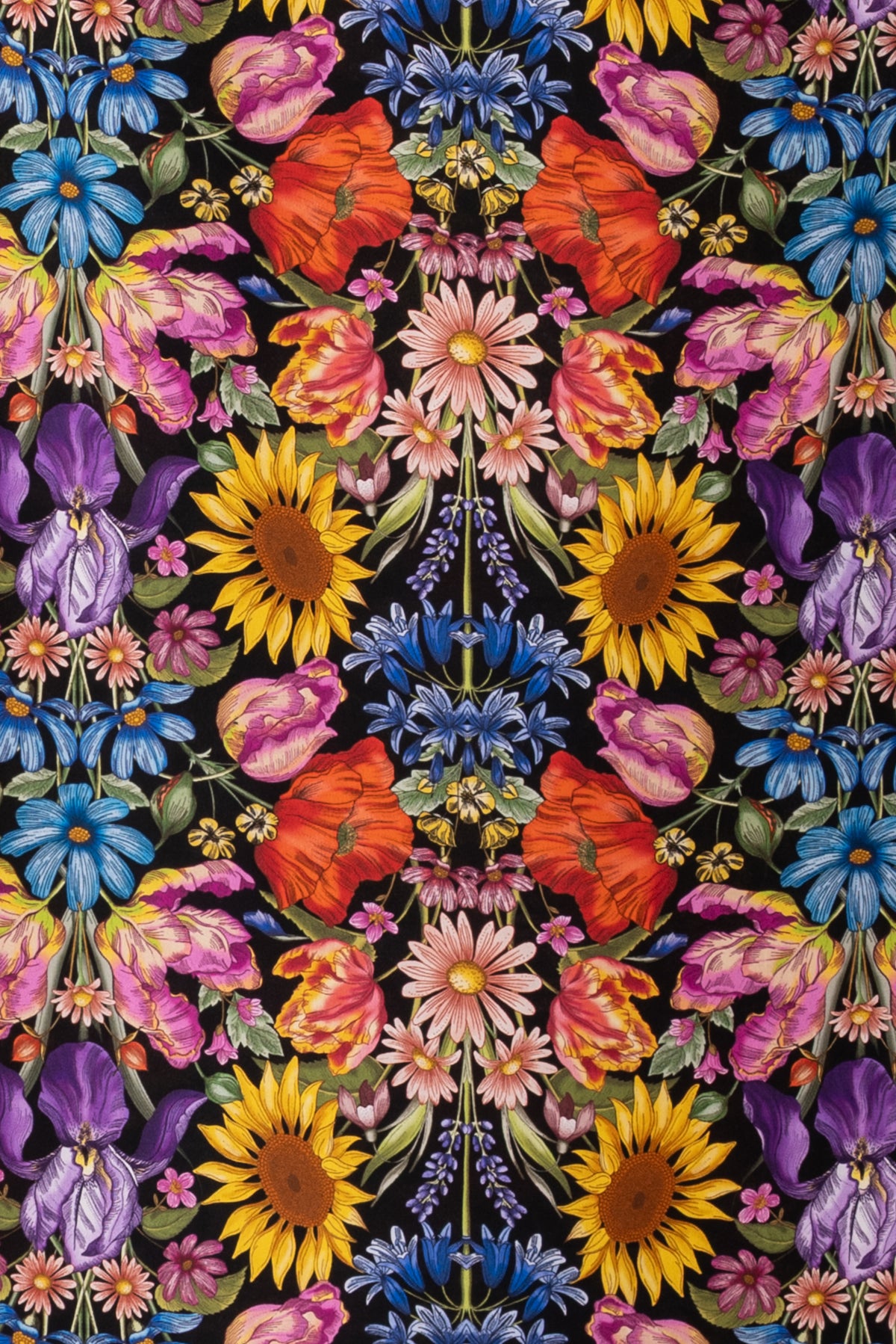 Vibrant floral fabric print with sunflowers, poppies, and irises on black background for sewing and quilting