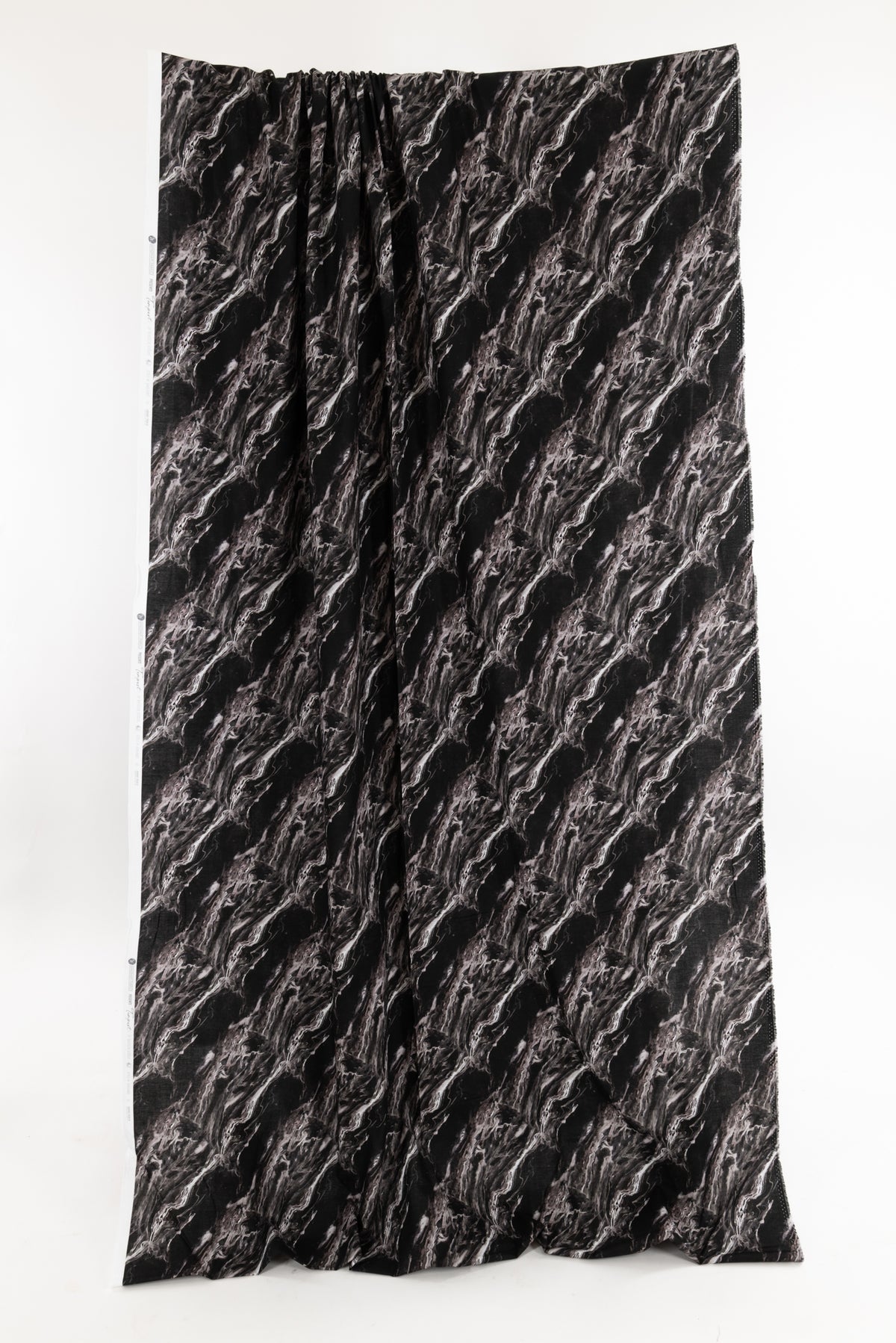 Black and white abstract marble print fabric by the yard, ideal for apparel and creative sewing projects.
