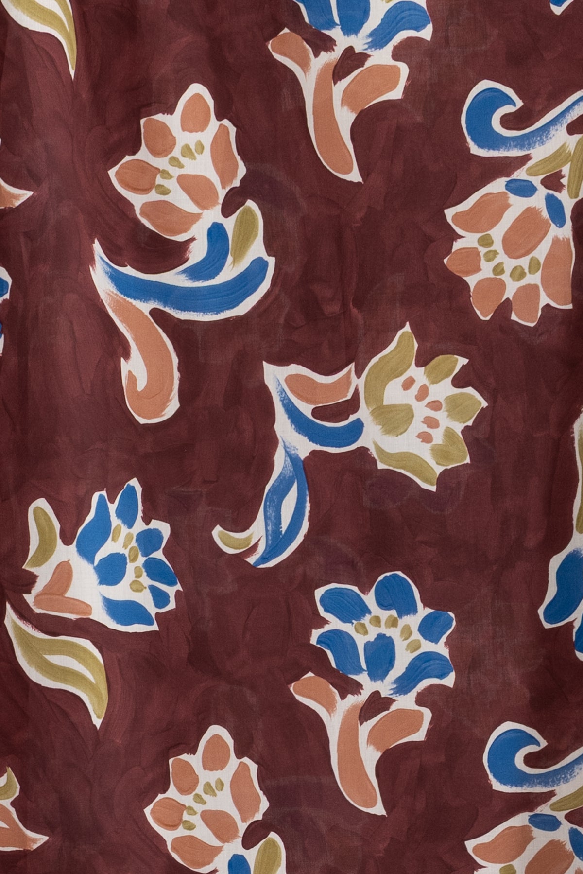 Floral print fabric with blue, rust, and olive blooms on deep burgundy background, ideal for apparel sewing