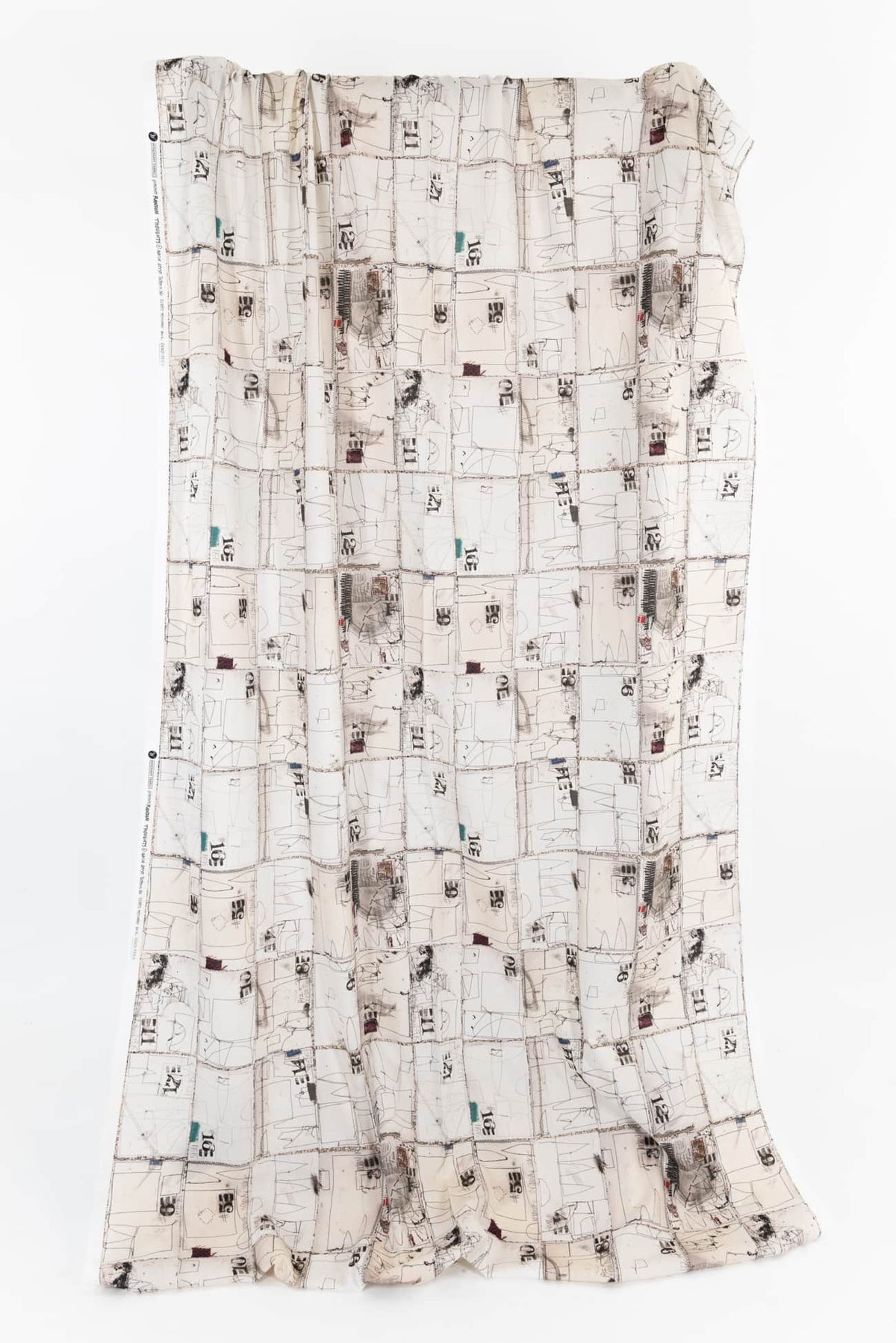 Abstract geometric print fabric by the yard, ideal for fashion sewing and apparel design projects.
