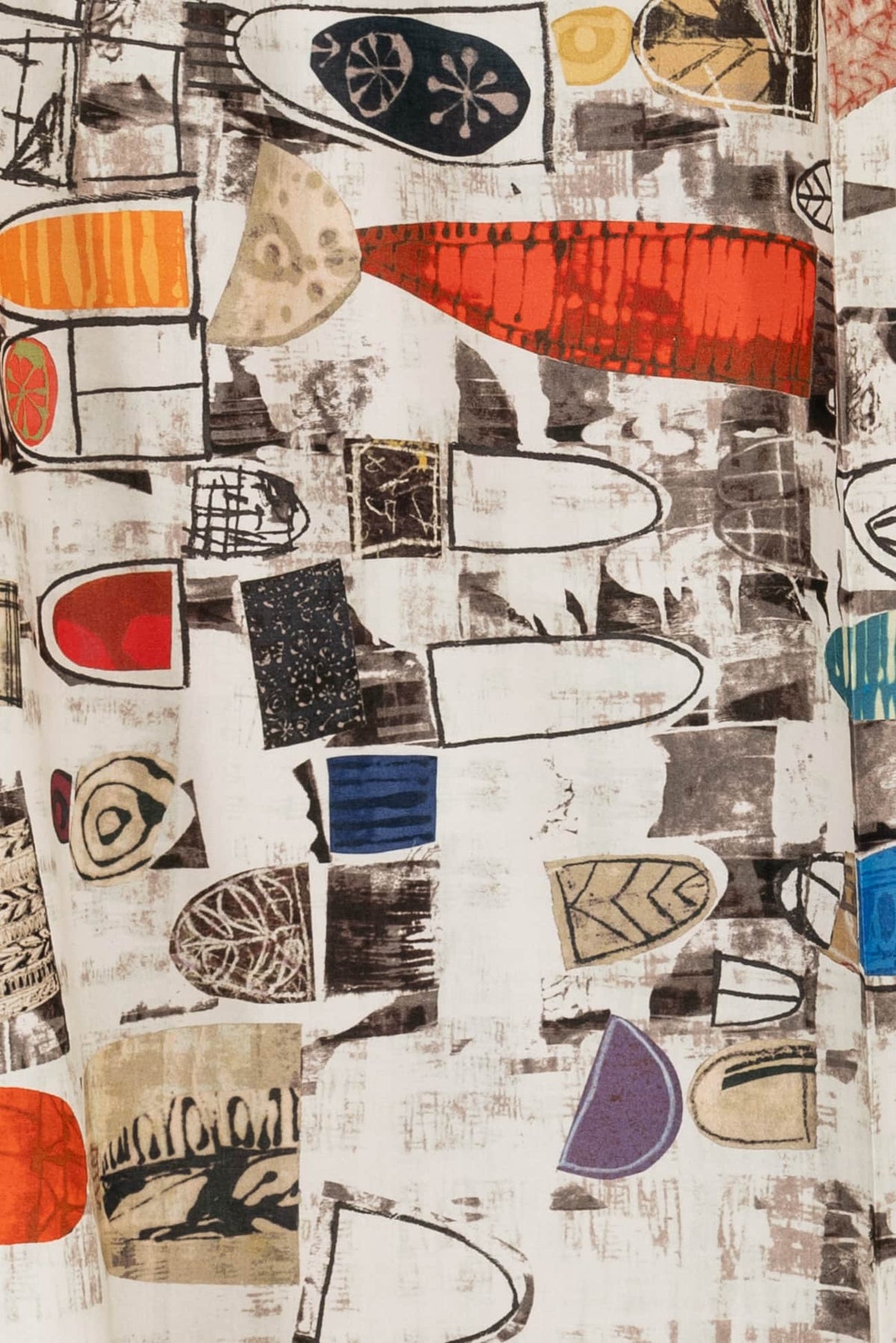 Abstract geometric print fabric with bold shapes and vibrant colors for apparel sewing