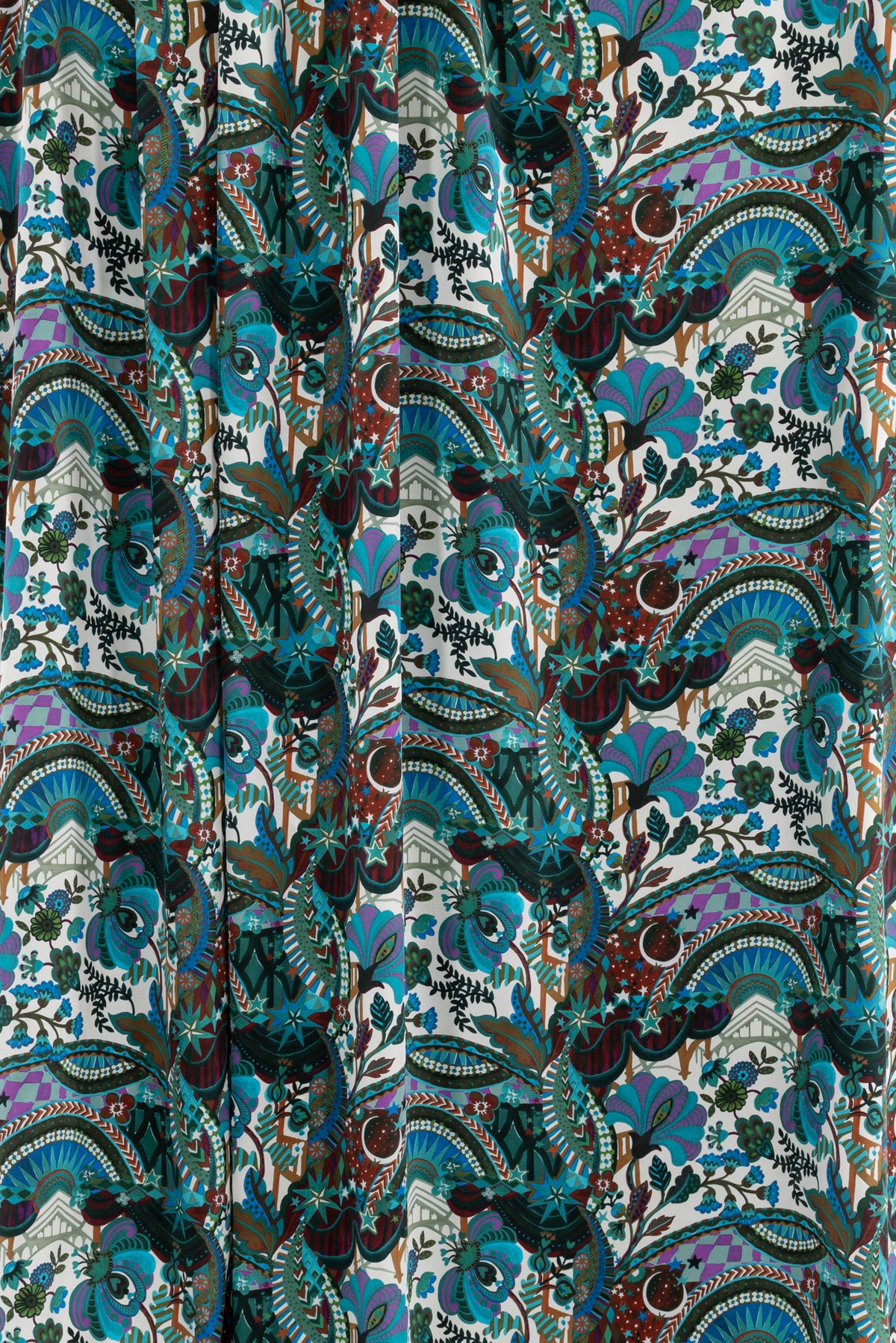 Vibrant paisley floral fabric with teal, purple, and burgundy prints for apparel sewing