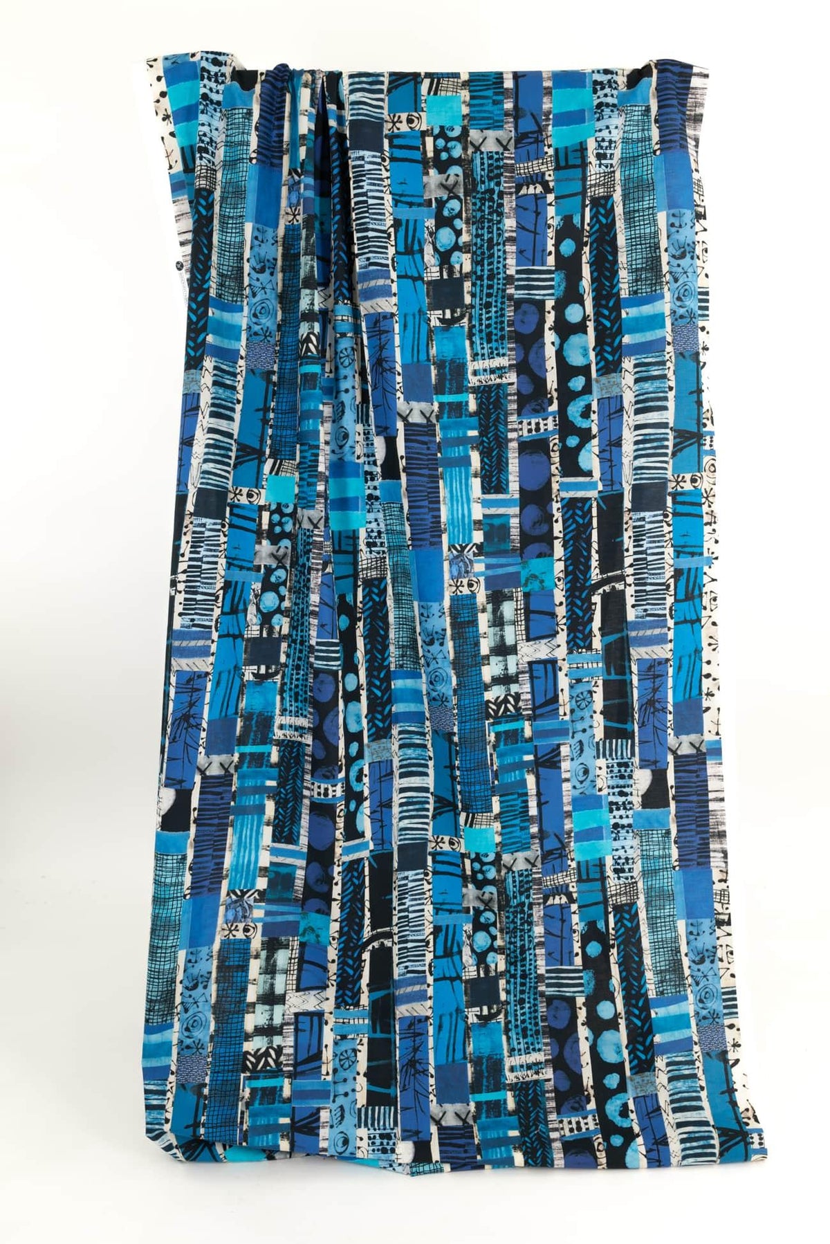 Blue abstract geometric print fabric by the yard, ideal for apparel and quilting projects