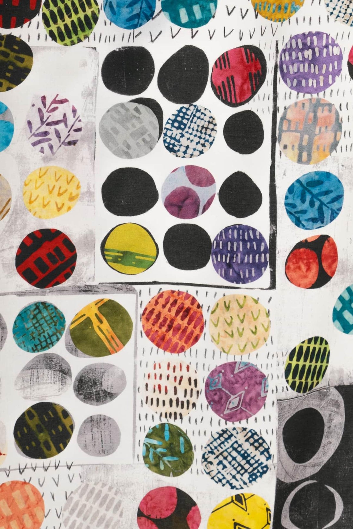 Colorful abstract fabric with geometric circles and patterns for sewing and quilting projects