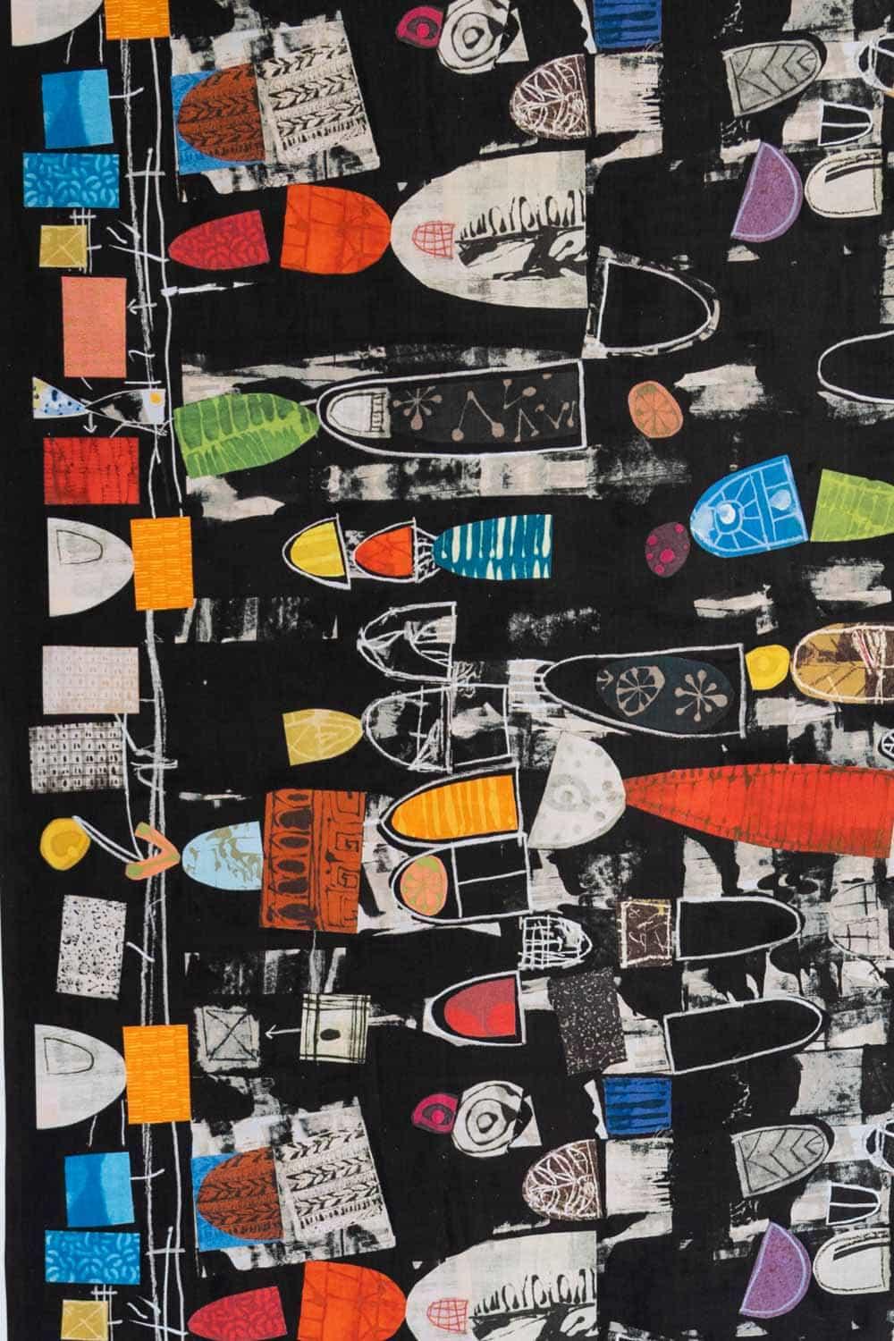 Bold abstract geometric print fabric with colorful shapes on black background, ideal for apparel and quilting projects.