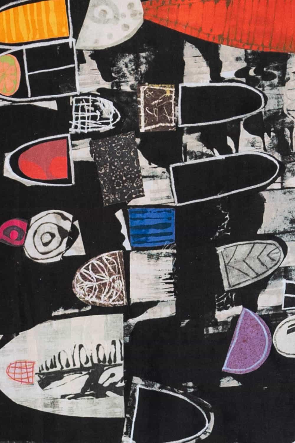 Abstract geometric fabric print with bold shapes, black background, and vibrant colors for apparel sewing