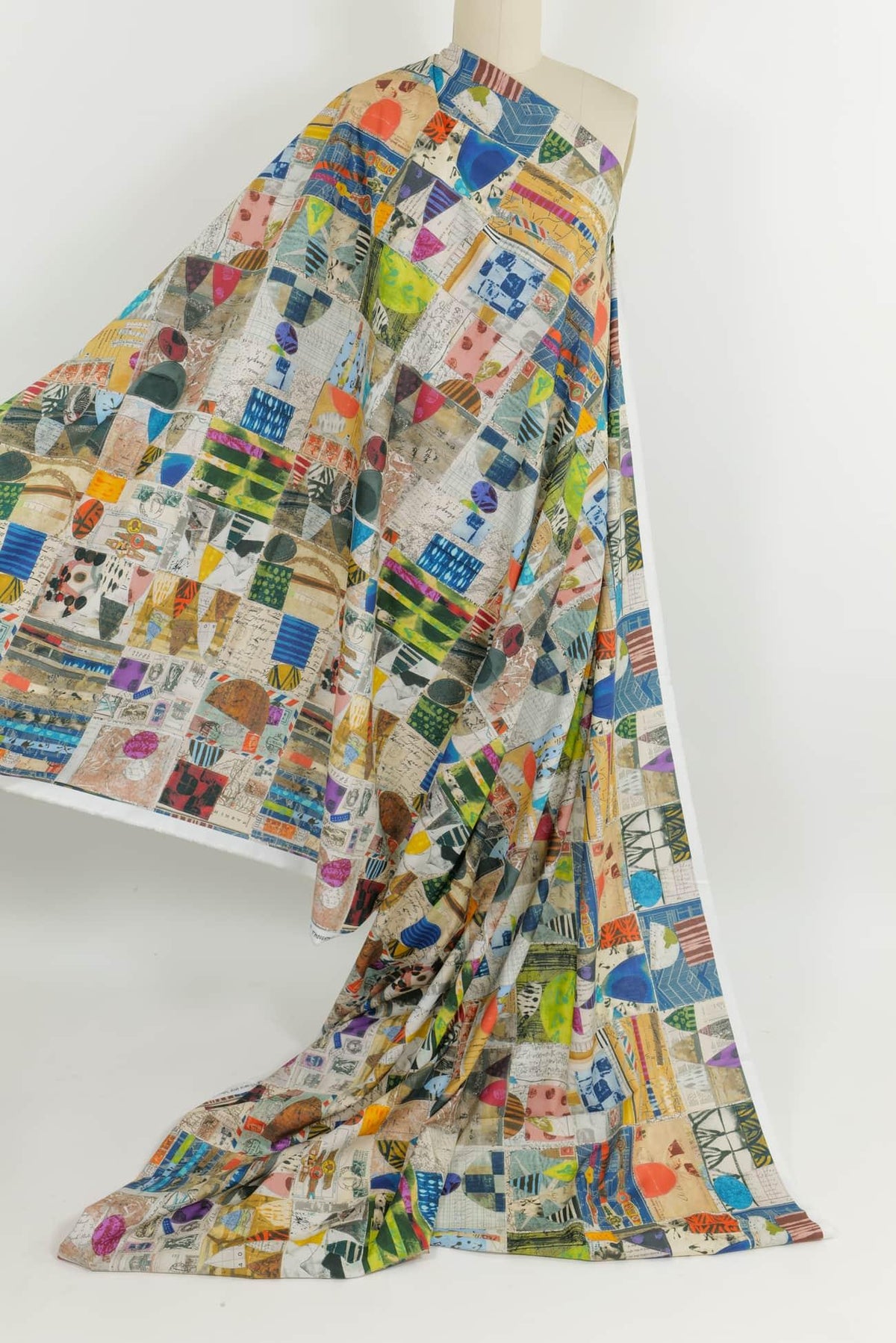 Colorful abstract patchwork fabric by the yard, ideal for quilting and apparel sewing projects