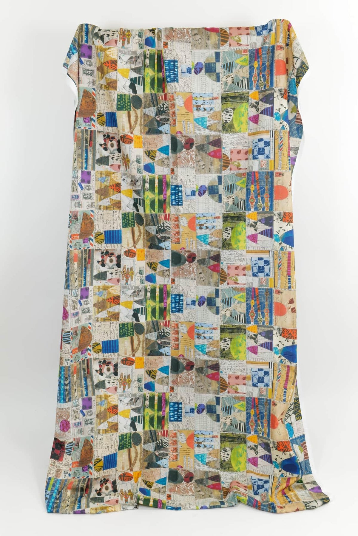 Colorful abstract geometric patchwork fabric by the yard for quilting and apparel sewing projects