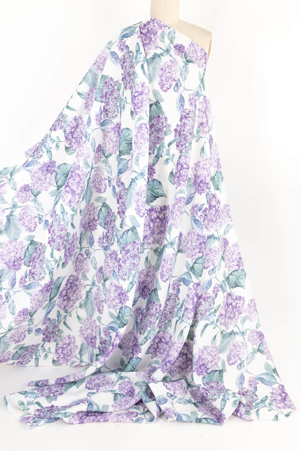 Purple hydrangea floral fabric on mannequin, ideal for apparel and quilting projects