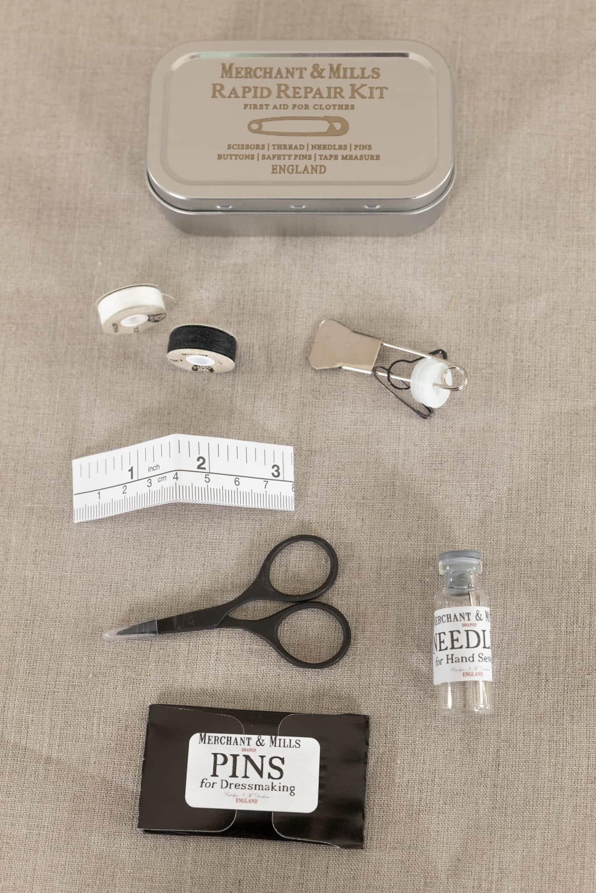 Merchant & Mills Rapid Repair Kit with sewing essentials: thread, needles, pins, scissors, tape measure for dressmaking